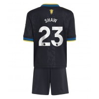 Stroje piłkarskie Manchester United Luke Shaw #23 Koszulka Trzeciej dla dzieci 2025-26 Krótki Rękaw (+ szorty)